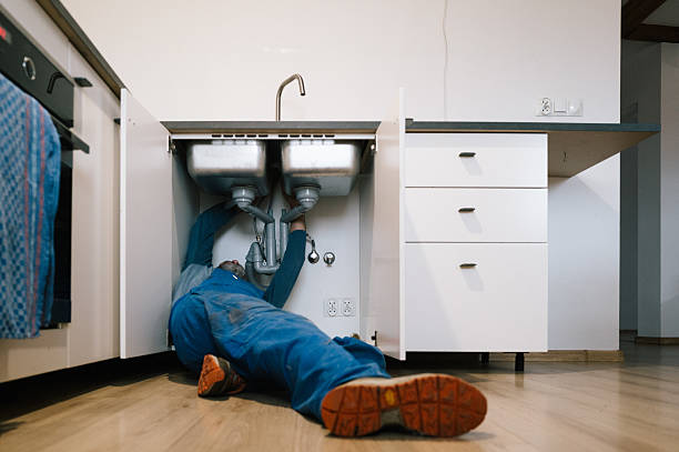 Professional Emergency Plumber technician working in Grant, MN